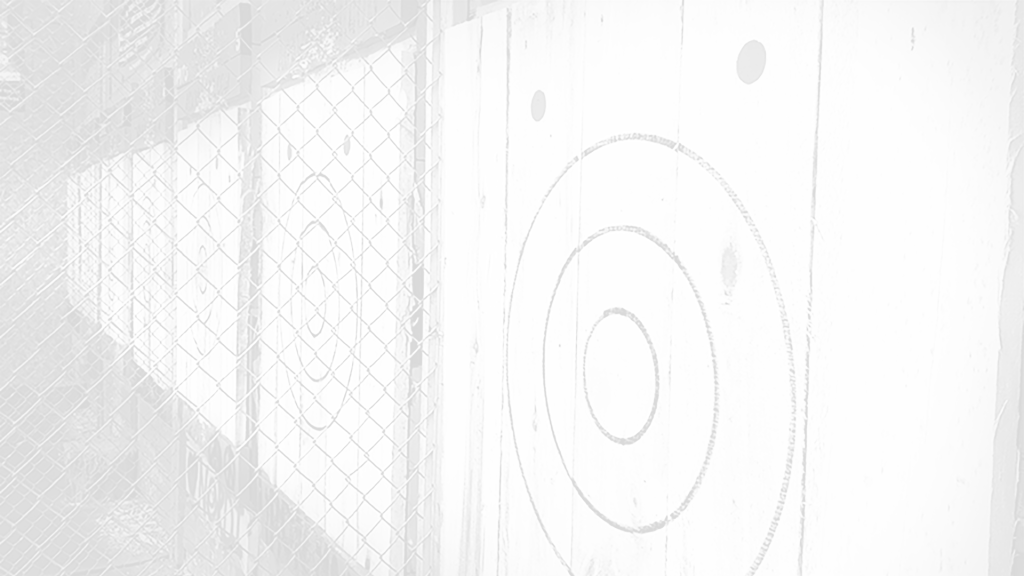 Wall of axe throwing targets at the Agawam Axe House. Photo by Anneliese Townsend.