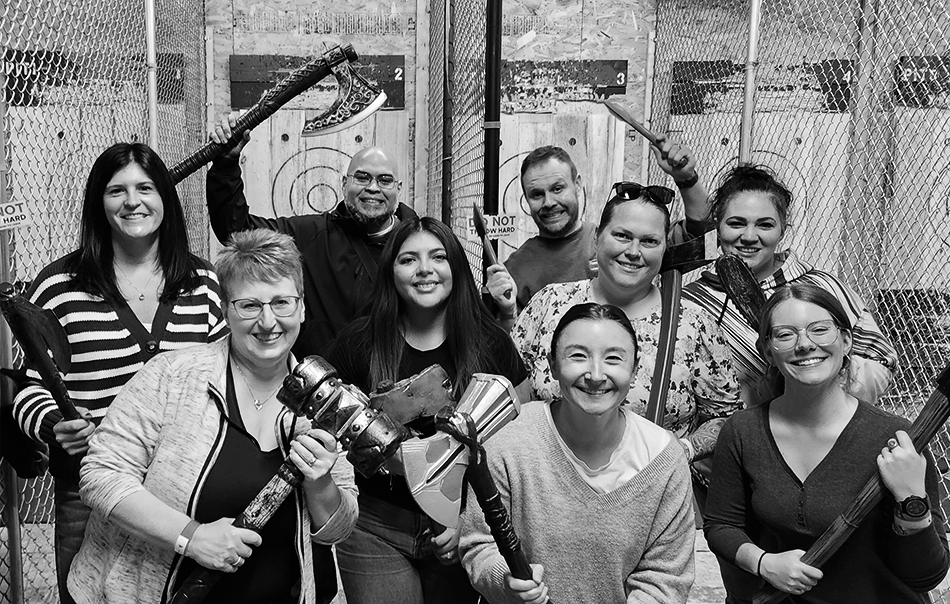 A group of Axe Throwers celebrating