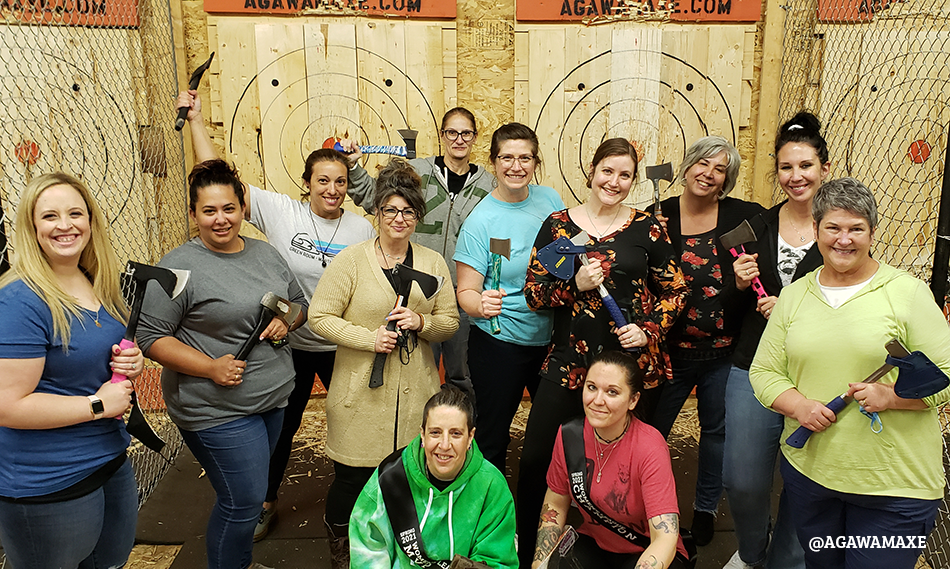 A women's axe throwing league at the Agawam Axe House. Photo by Anneliese Townsend.